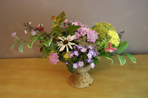 Designer Arrangement in Iron Pedestal Vessel