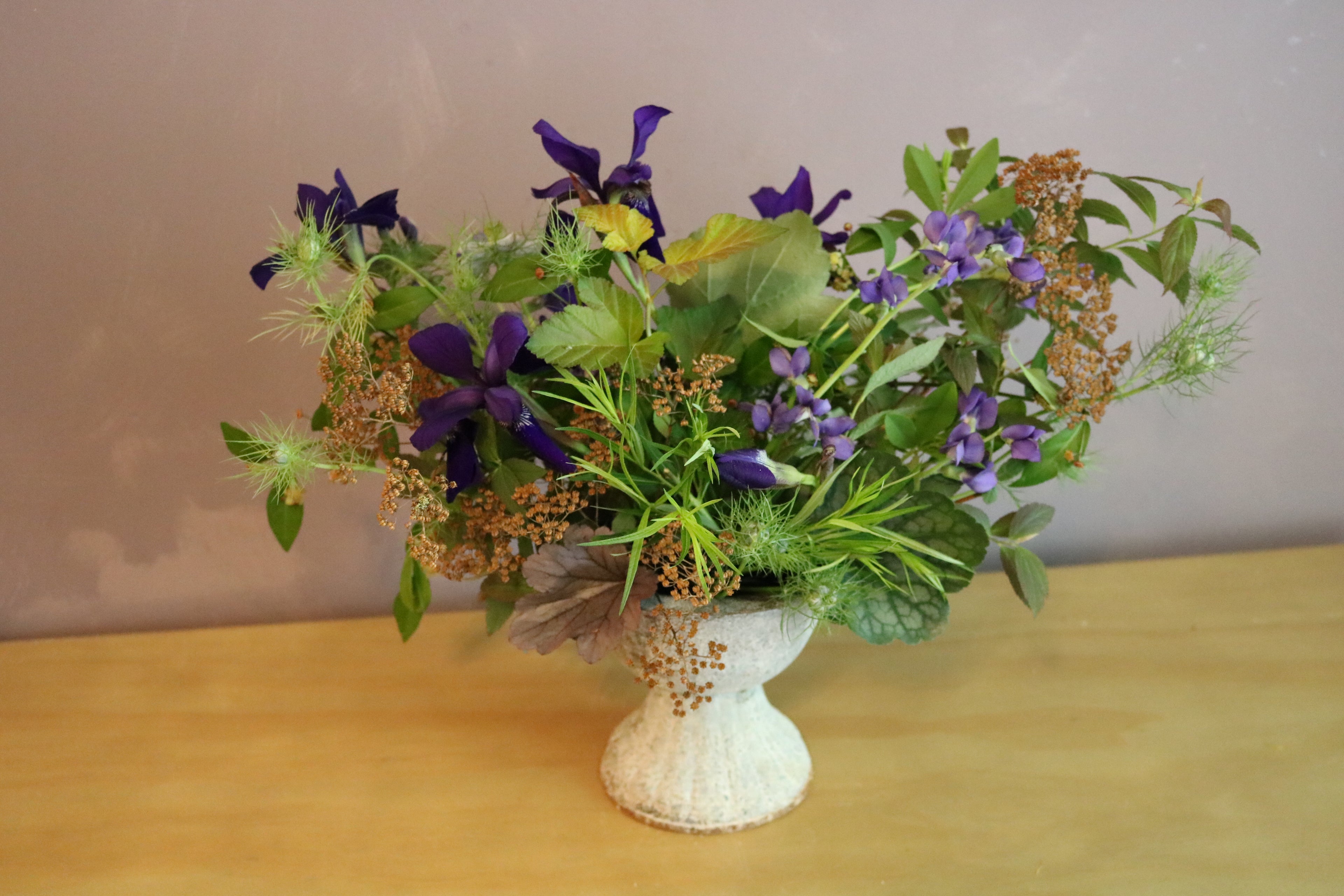 Designer Arrangement in Iron Pedestal Vessel